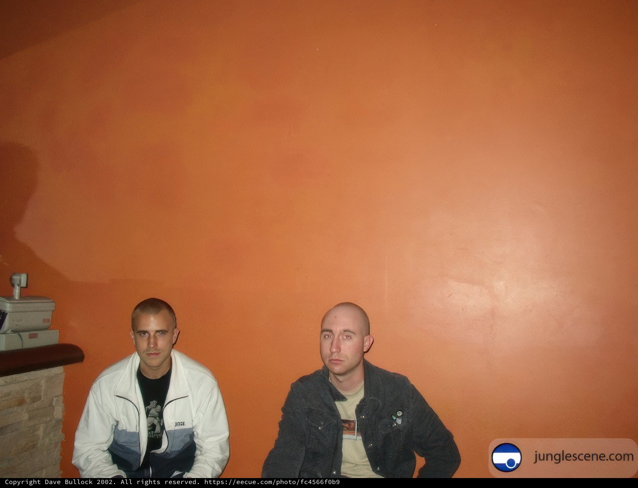 Relaxing in Front of an Orange Wall