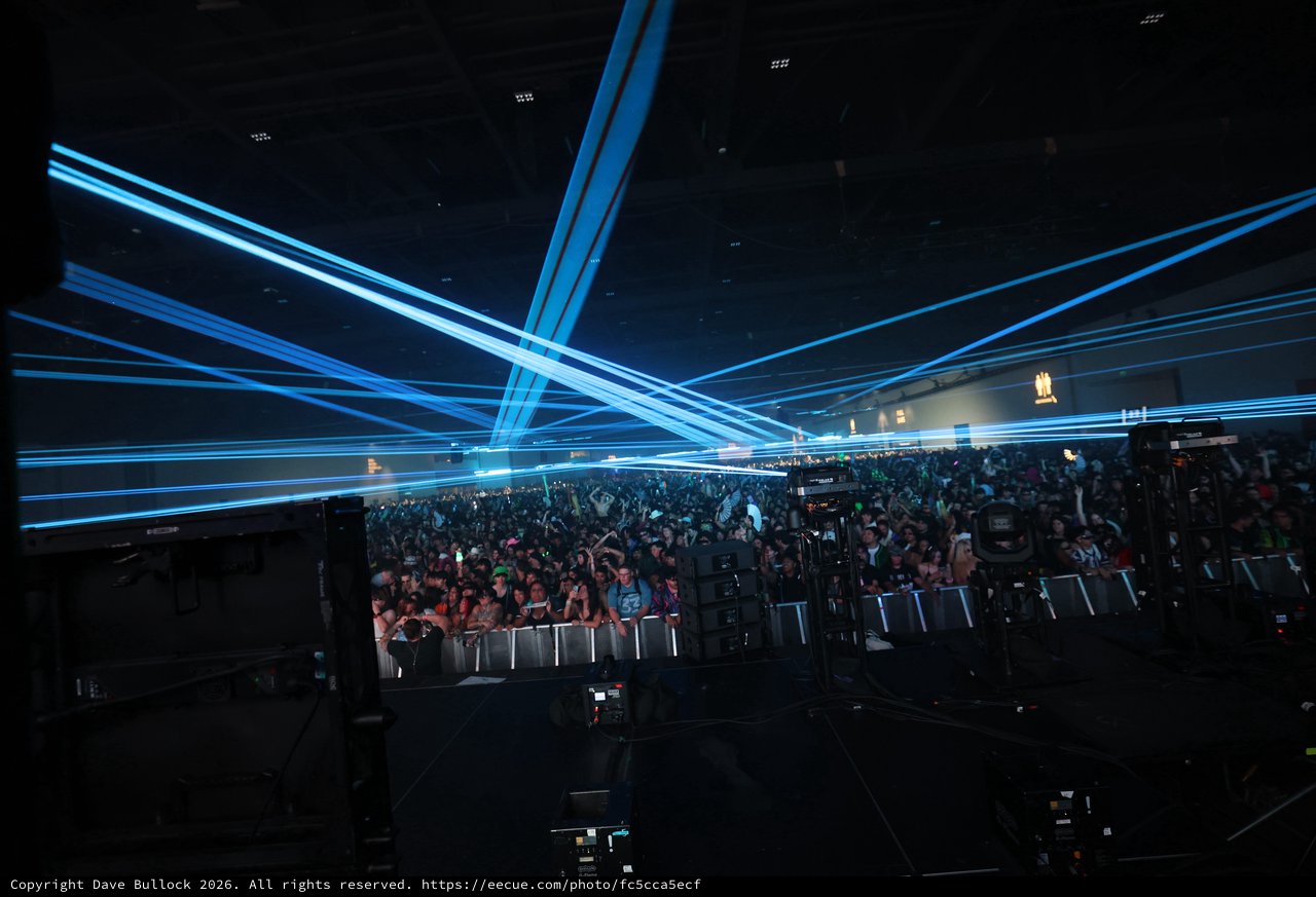 Blue Laser Storm Over Wobbleland Festival Crowd