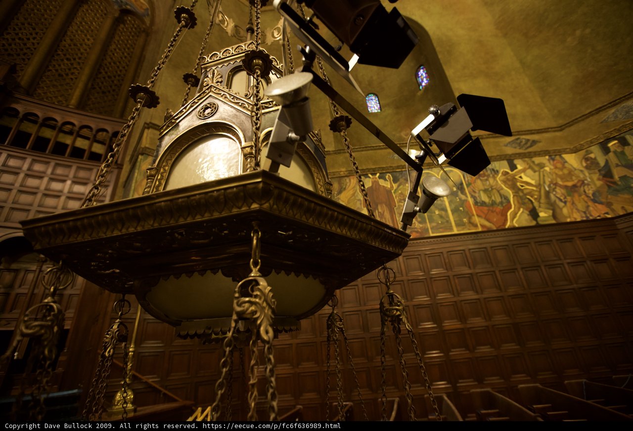 Illuminating Altar: A Stunning Chandelier in a Temple Crypt
