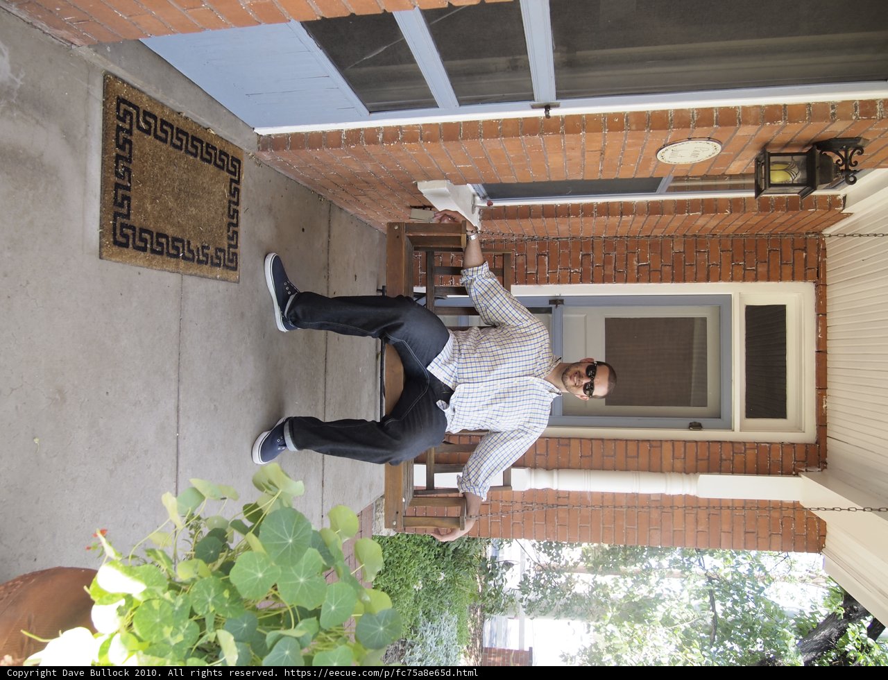 Man on Porch Bench