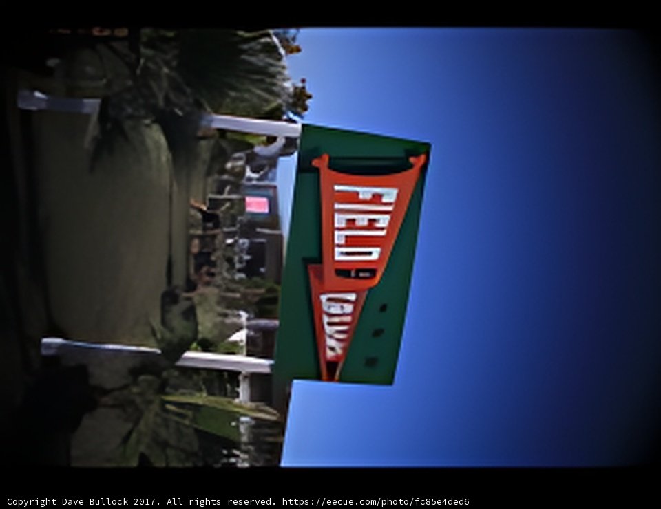 Red and White Sign for a Hotel Restaurant