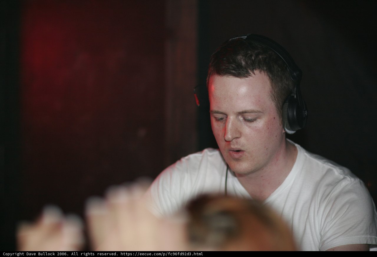 Party beats with white shirt and headphones