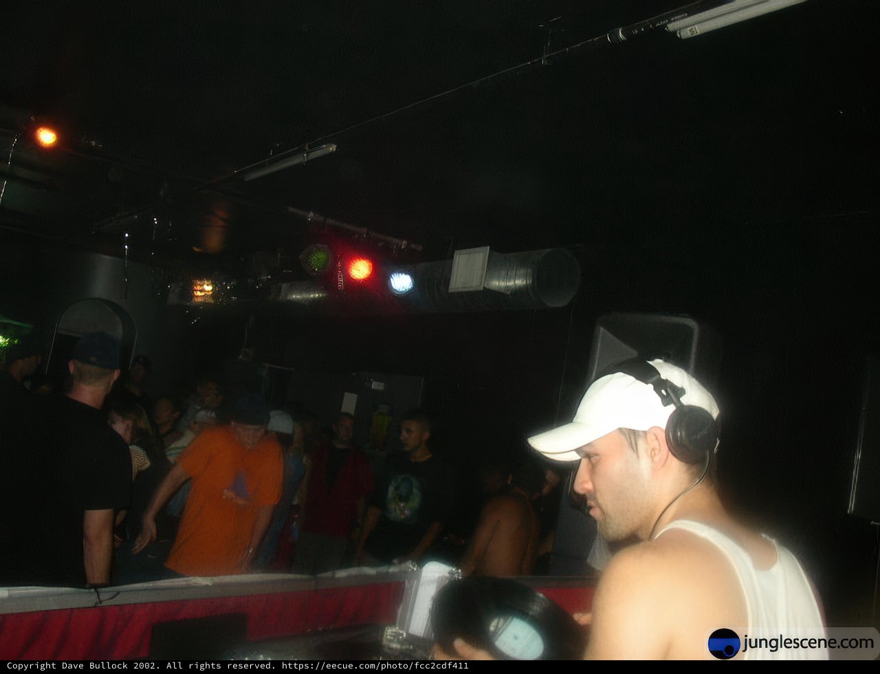 Nightclub Entertainer in Baseball Cap