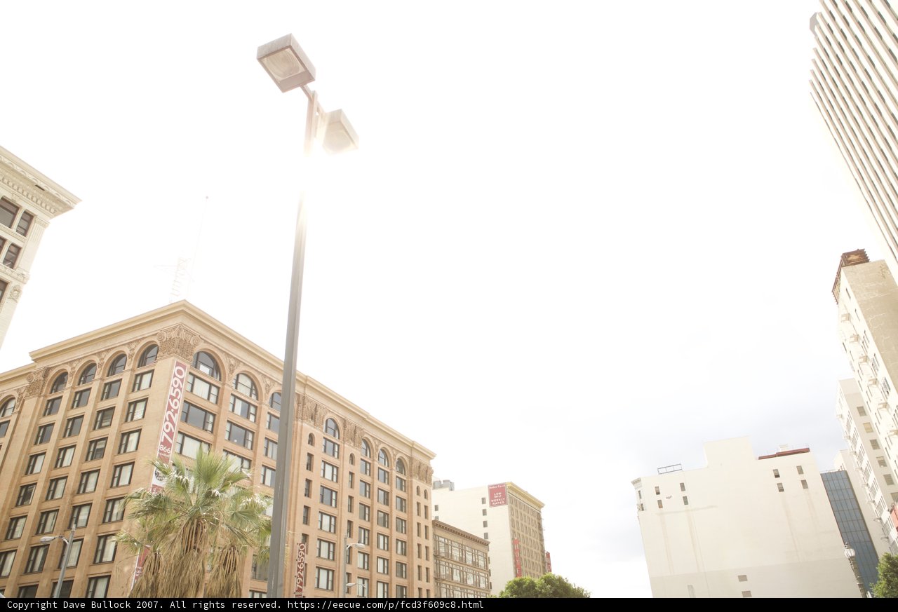 City Street Corner Illuminated by Lamppost