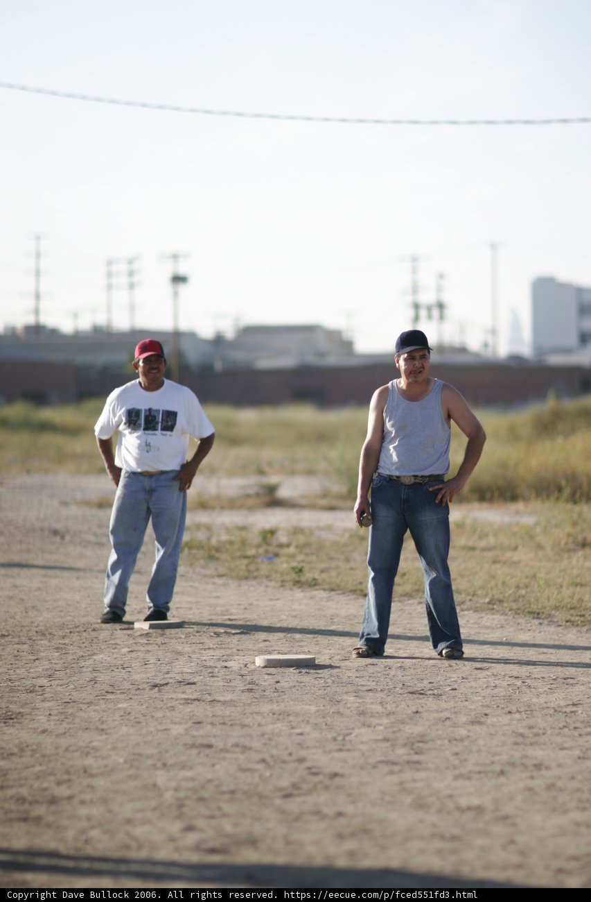 Two Men Enjoying a Game of Baseball