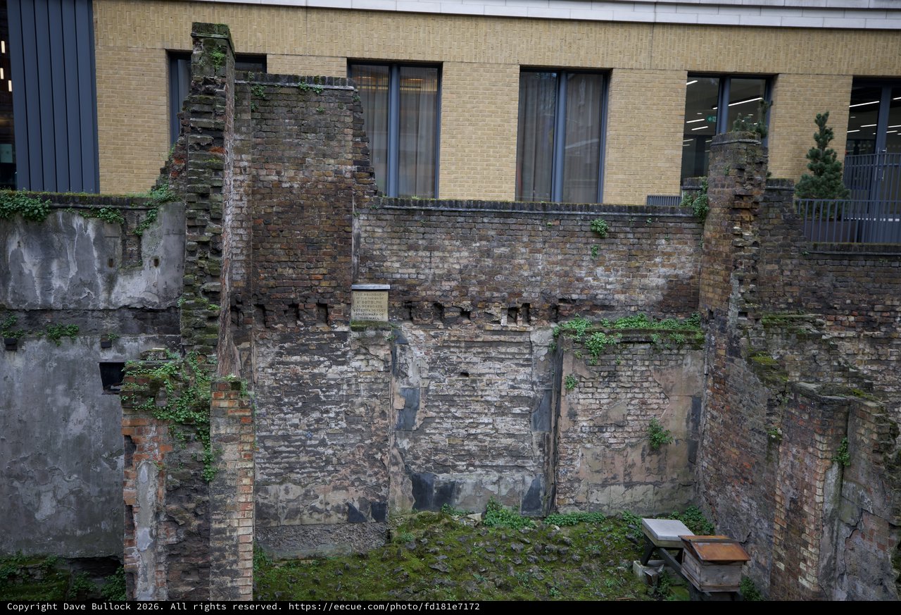 Preserved War Ruins Behind Modern London Architecture