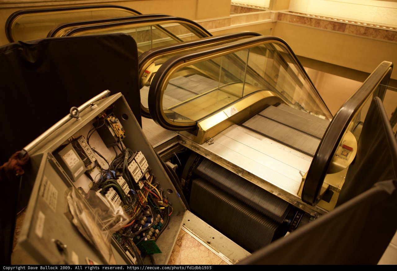 Modern Industrial Escalator with Glass Door