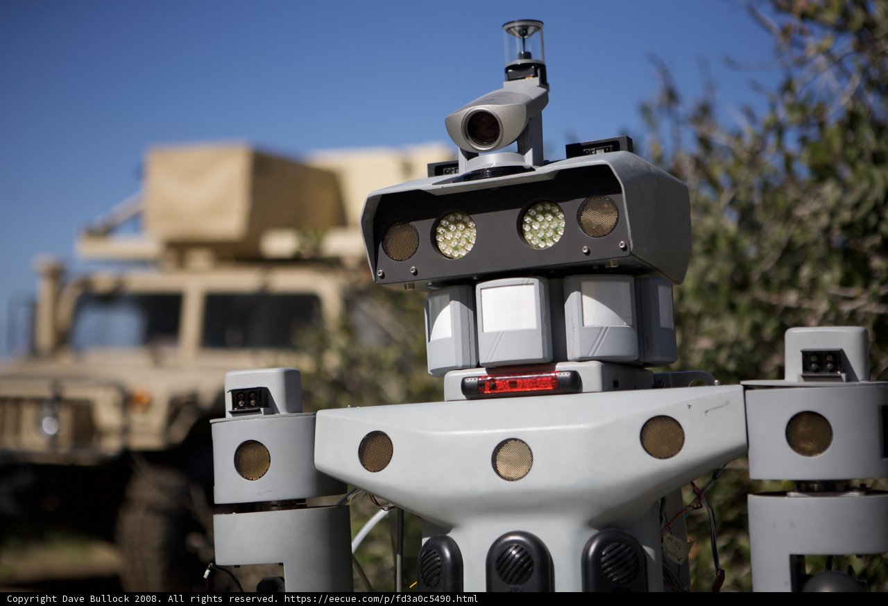 Robot guarding military vehicle