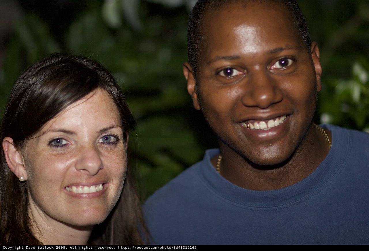 Two Friends Share a Warm Smile Outdoors