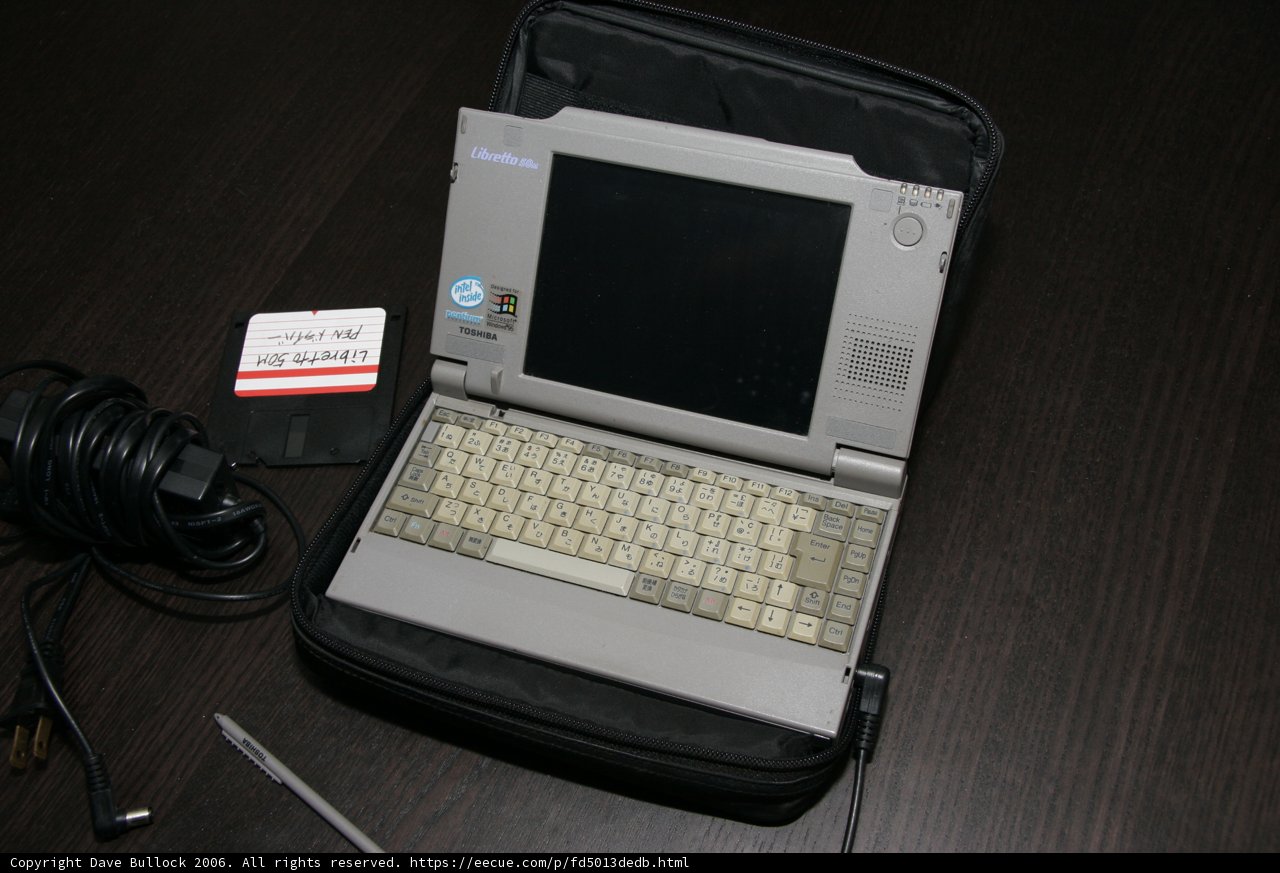 Vintage Laptop Computer with Accessories