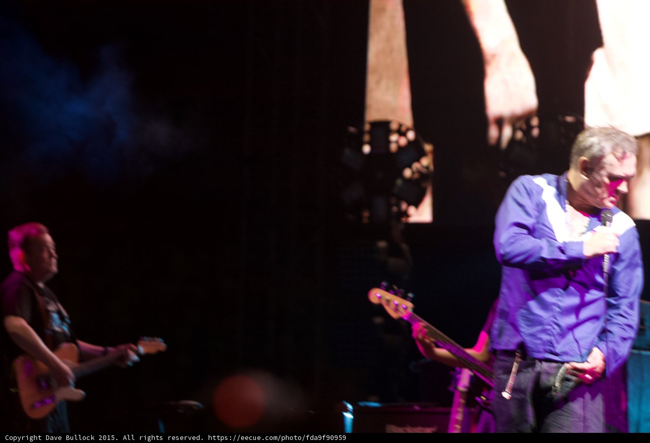 Morrissey Wide Shot Blue Shirt Guitarist Blue Smoke Smiths Dangling Hands Screen Dark Stage