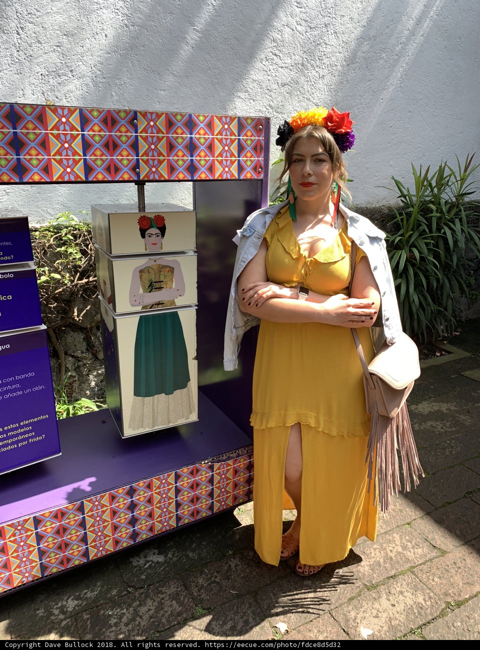 Yellow dress and flower display