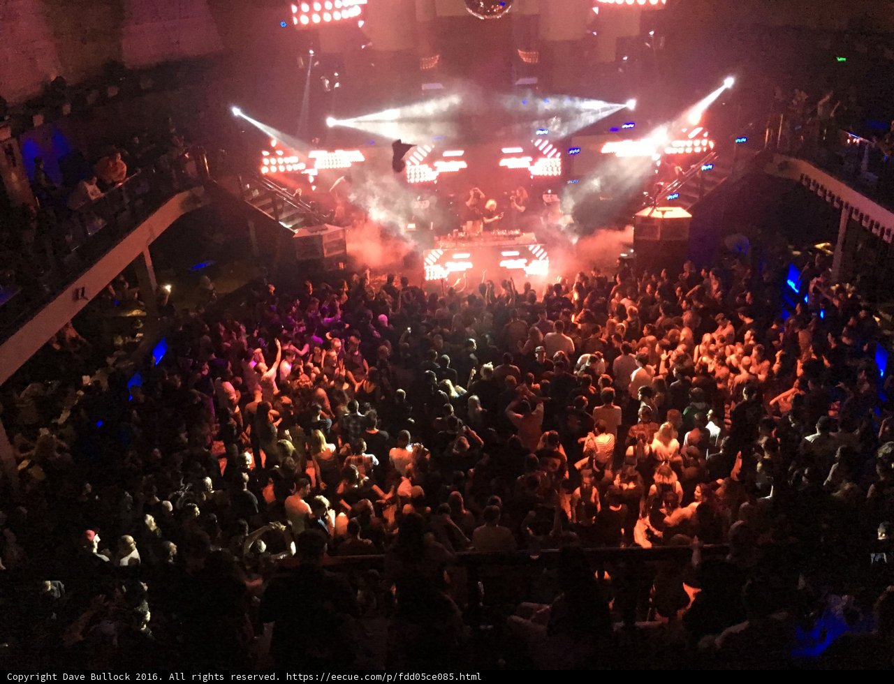 Night Club Lights Illuminate Exciting Crowd