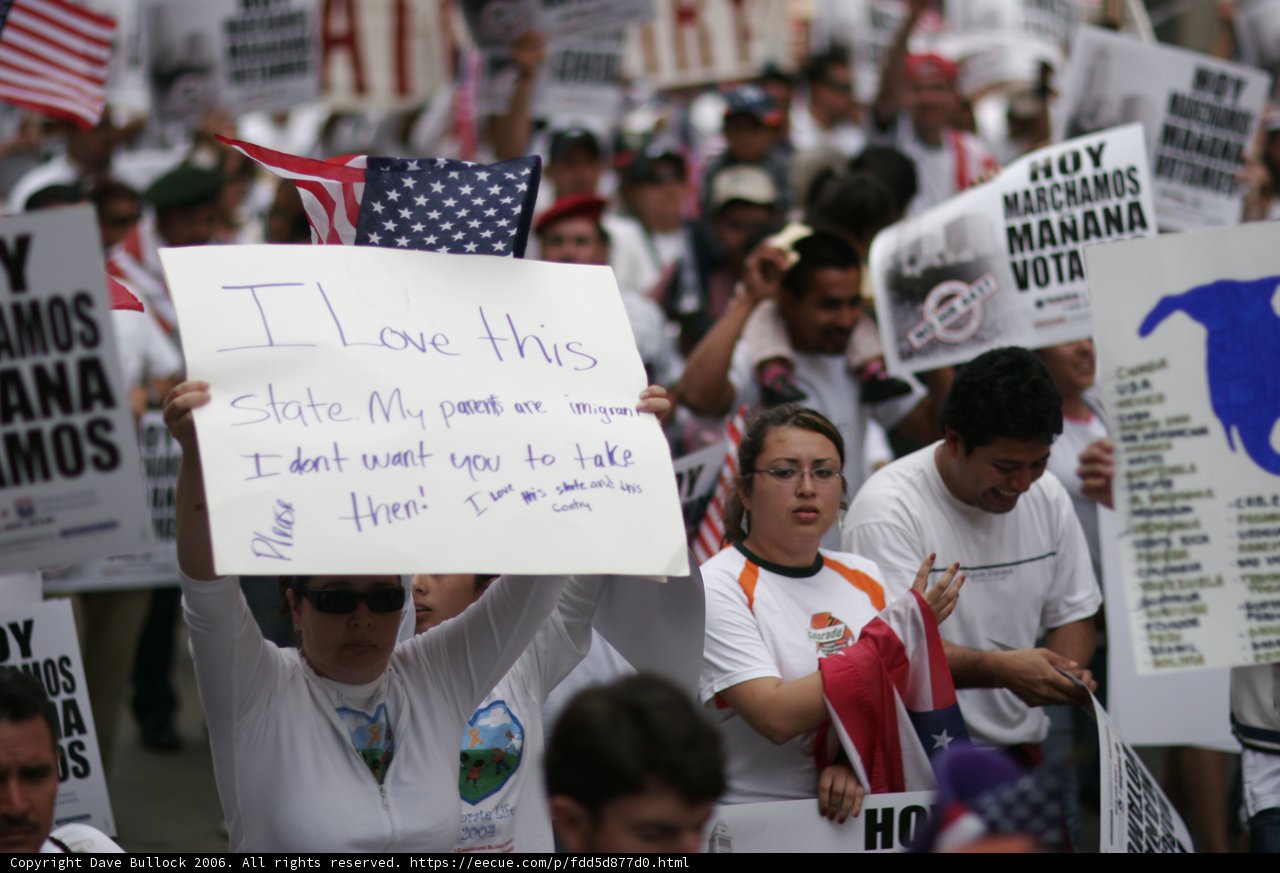 People Holding Signs During a Protest Parade