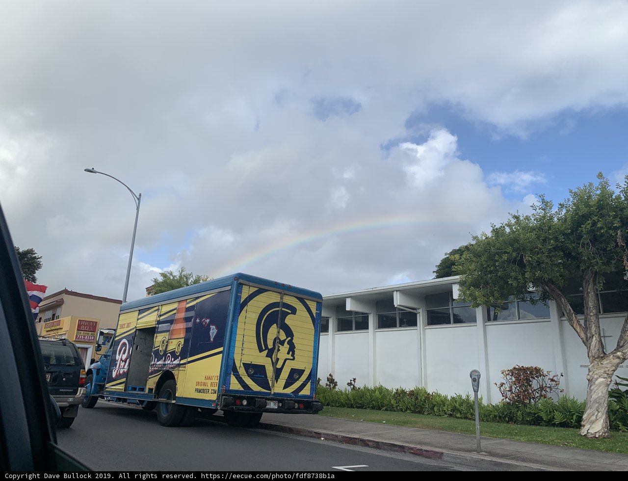 Rainbow Truck on the Side of the Road