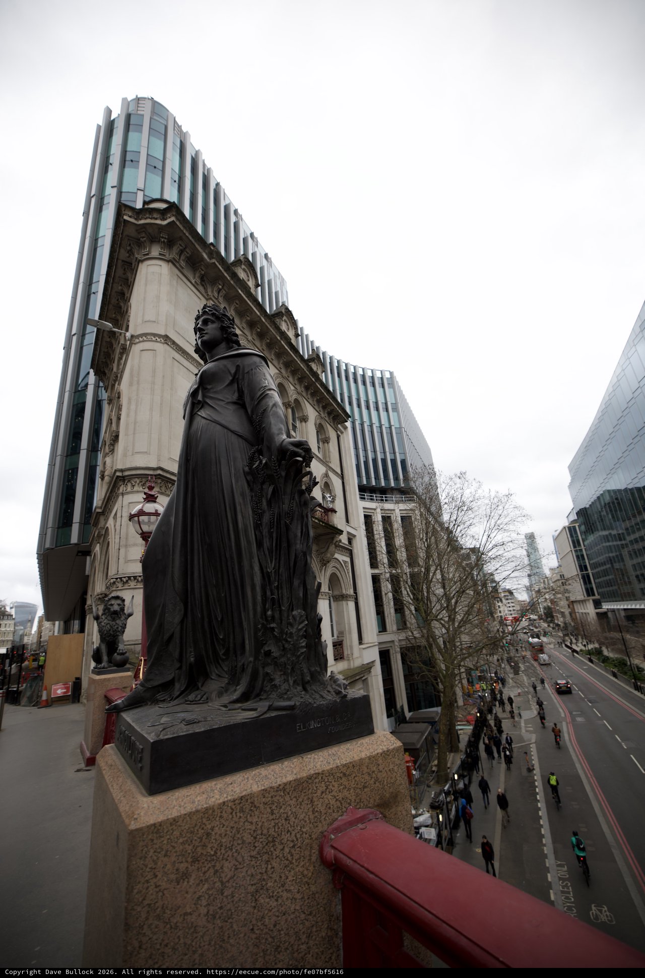 Eliza Cook Statue Overlooking Modern London Street