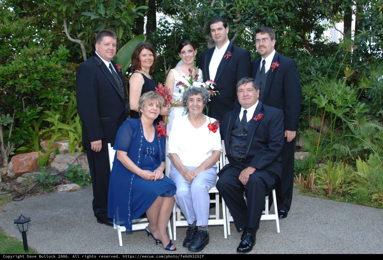 Family Portrait at Outdoor Garden Wedding Celebration