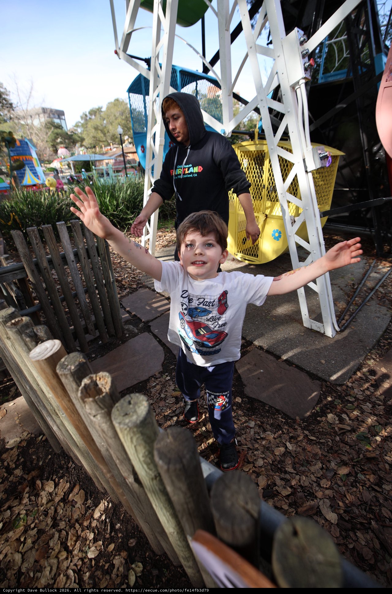 Young Boy's Joyful Moment at Theme Park Playground