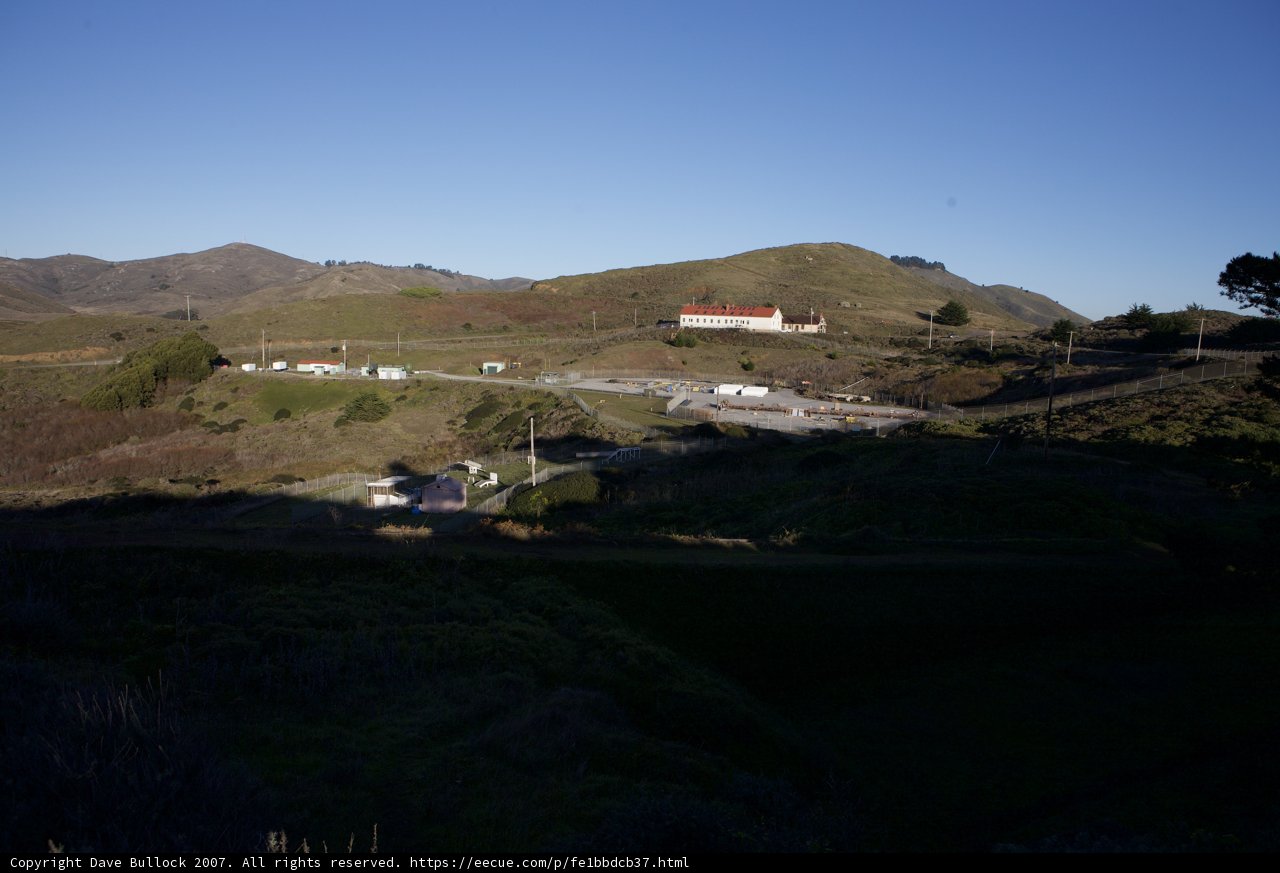 Red Building Nestled in Hillside
