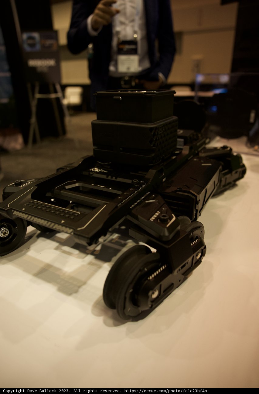 Man amidst Machines at Robobusiness Conference & Expo, 2023