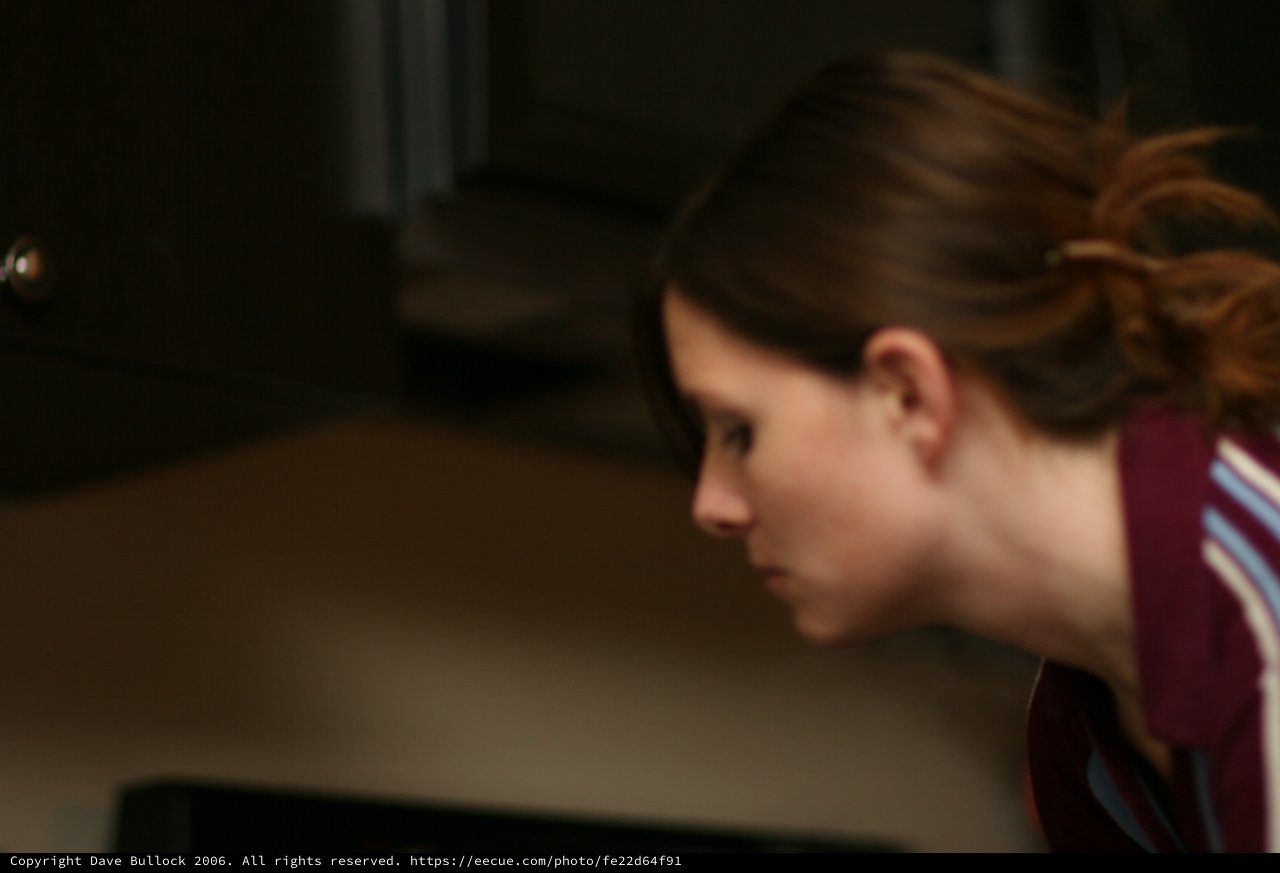Young Woman in Focused Concentration, Side Profile