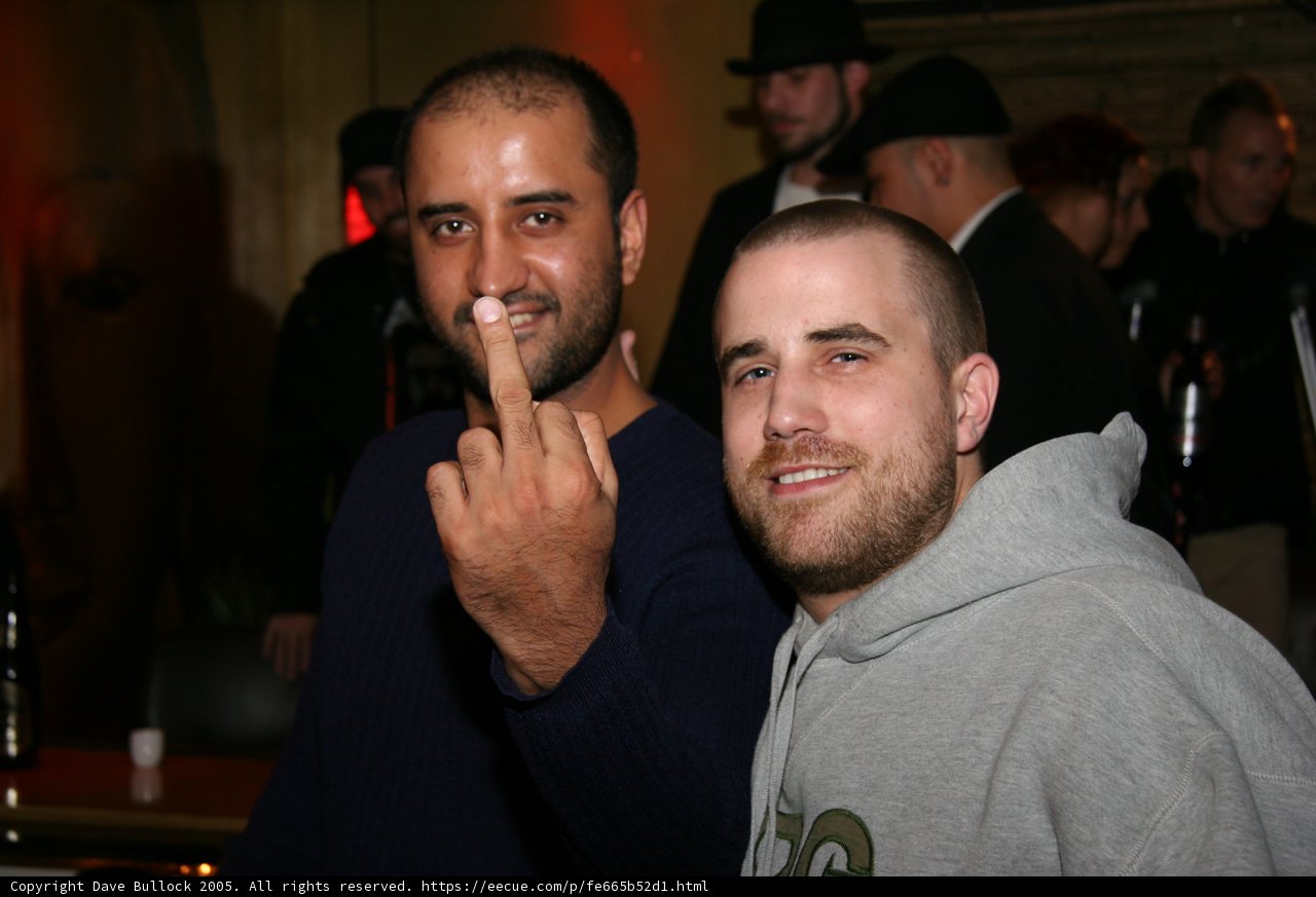 Two Men Strike a Pose