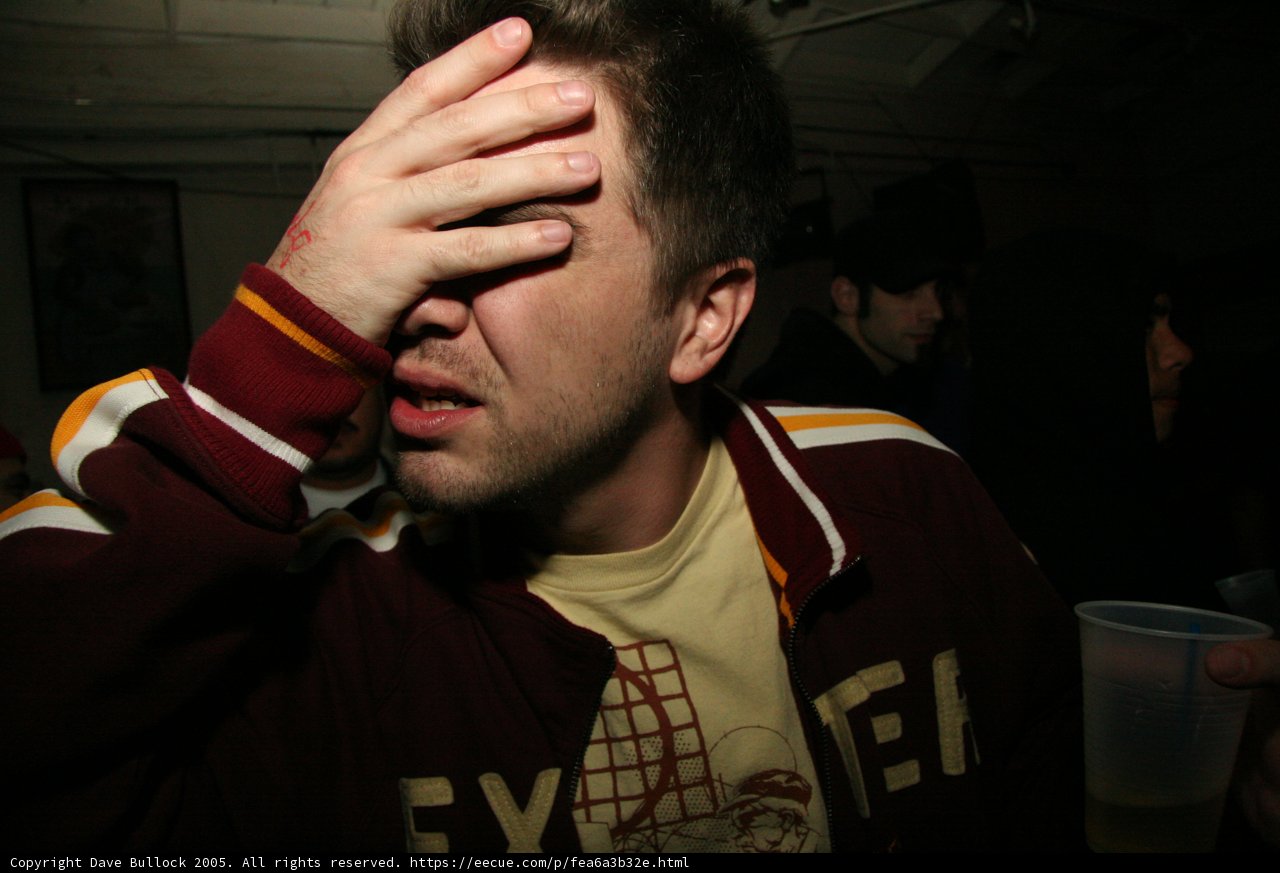 Maroon Jacket Man