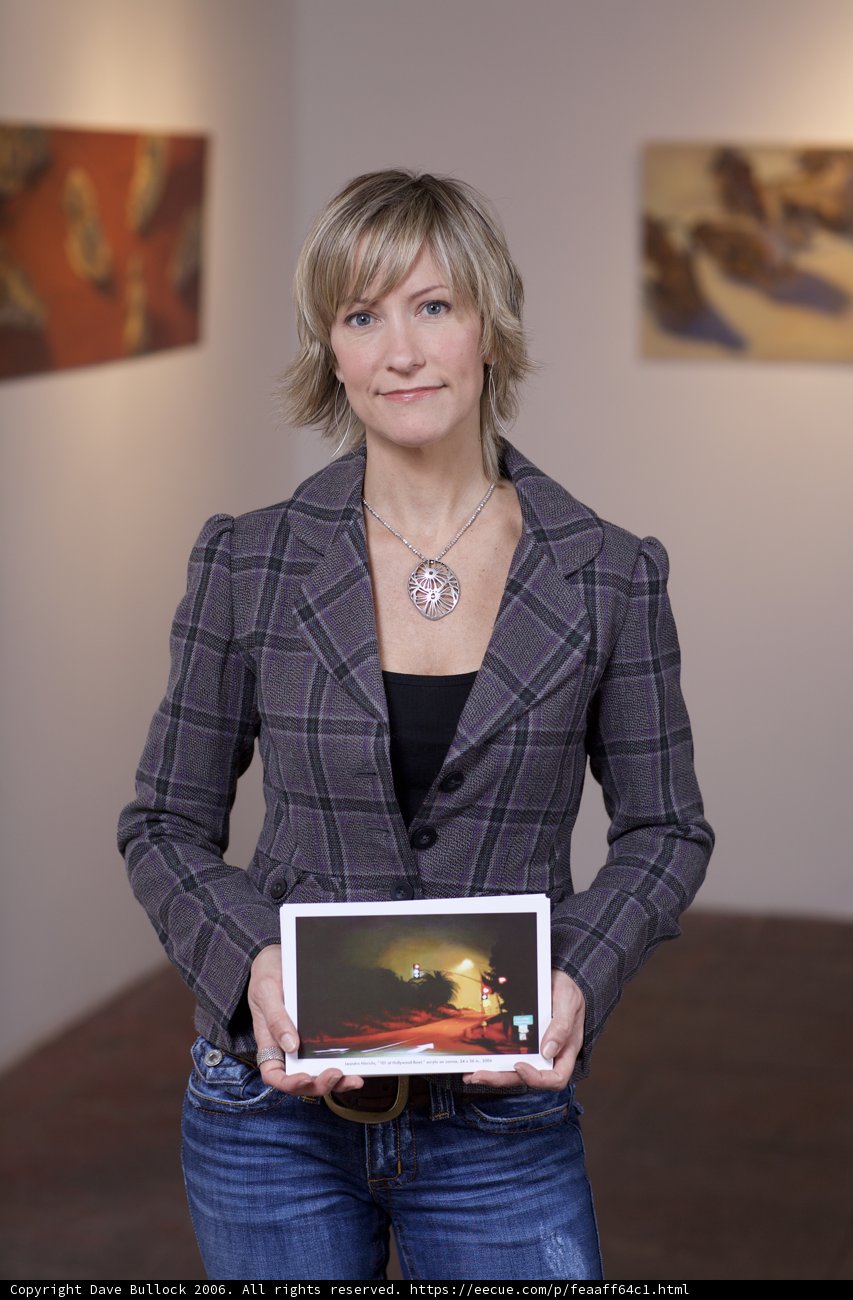 Woman Engages with Art on Tablet
