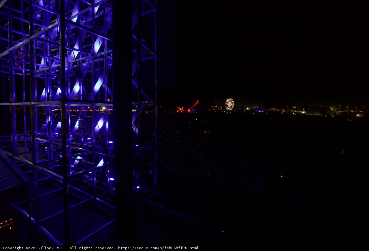 Blue Lights and a Ferris Wheel Illuminate the Night Sky at Coachella 2011