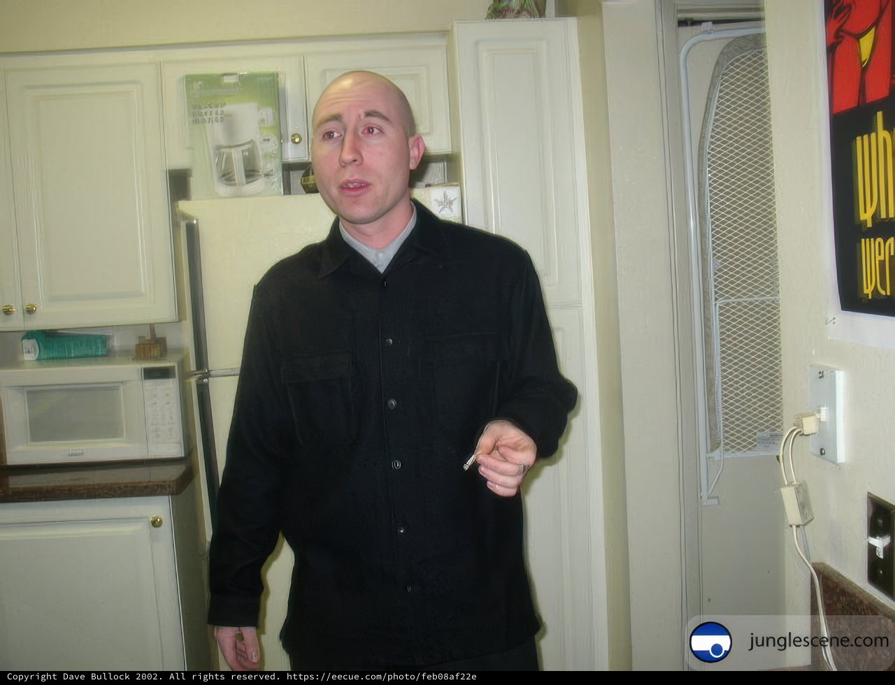Eric W Poses with Electrical Household Appliances