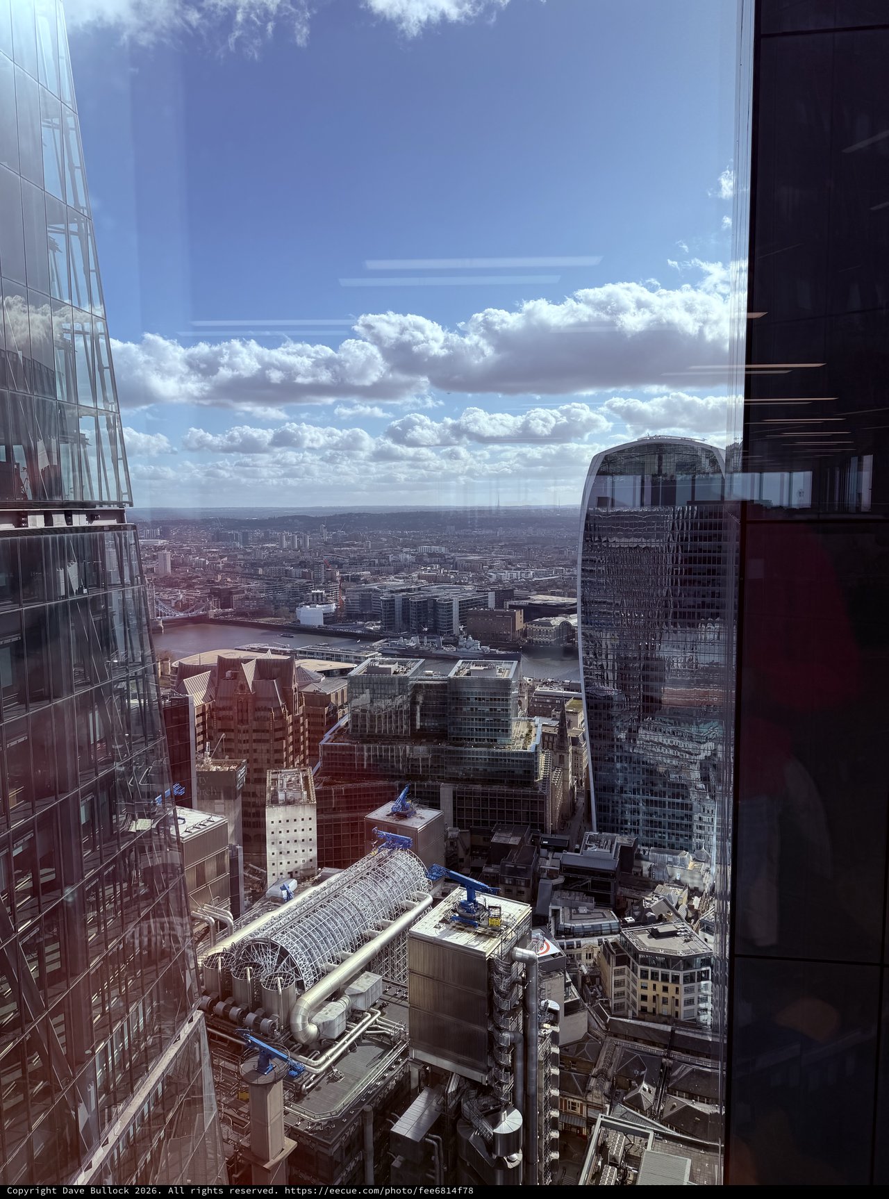 Aerial View of London's Financial District Under Dramatic Skies