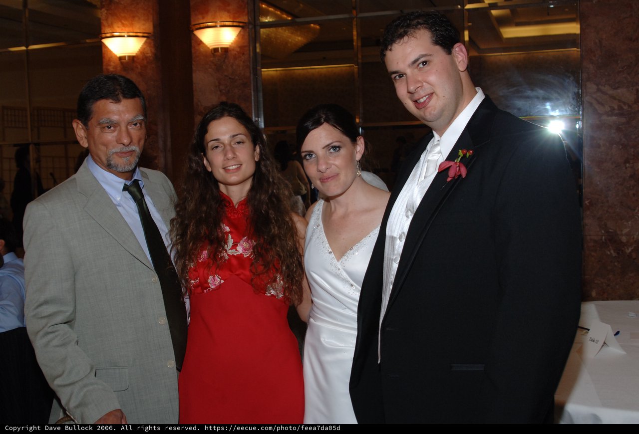 Wedding Celebration Group Portrait with Bride and Groom