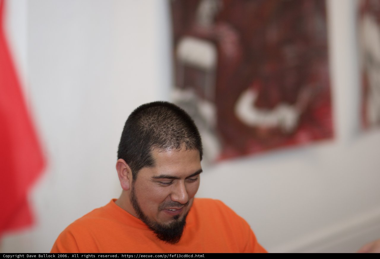 Contemplative Man in Orange