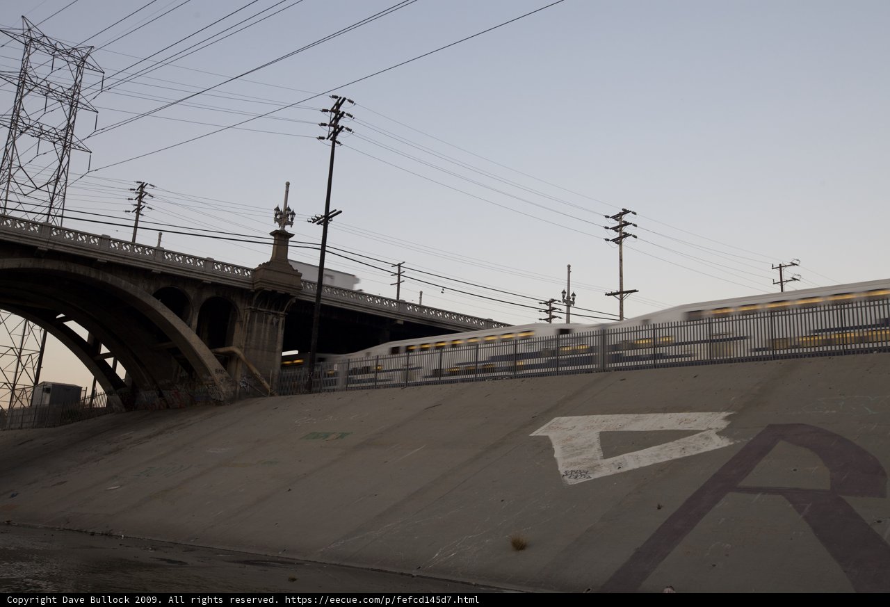 Train passing under the overpass