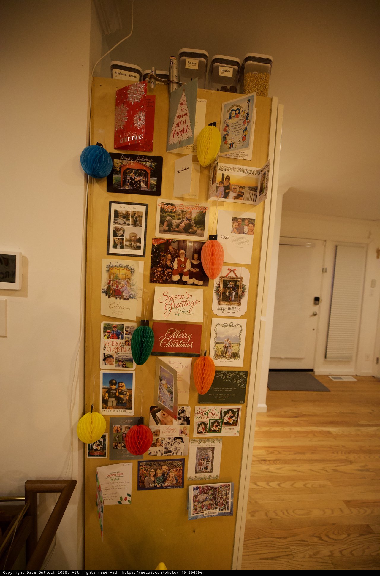 Holiday Card Display Wall with Festive Decorations