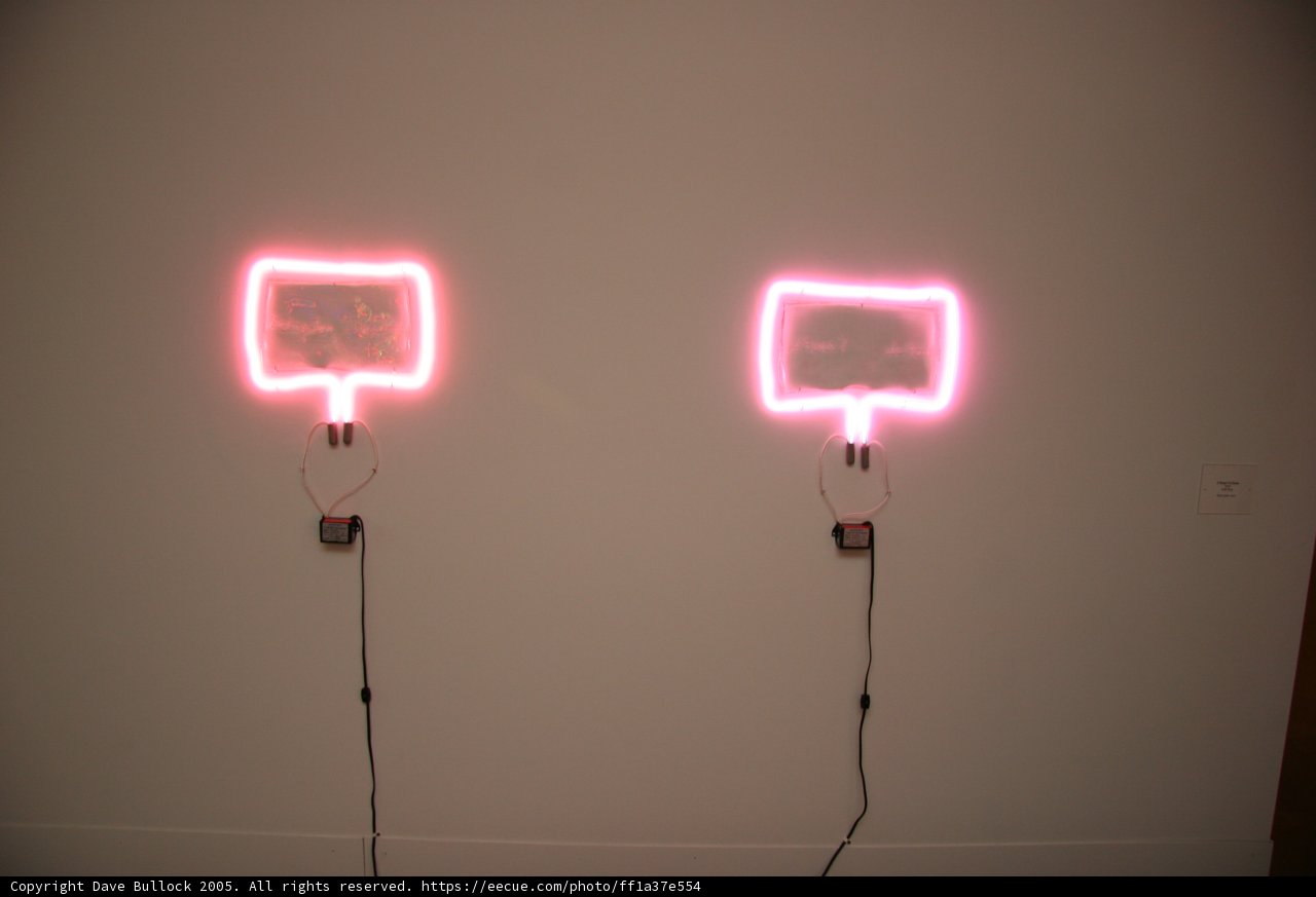 Bright Neon Signs Connected with Wires