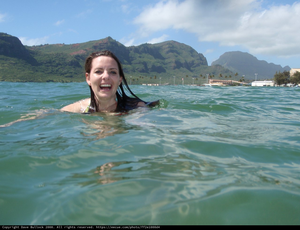 Joyful Swimmer Floating in Hawaiian Tropical Waters