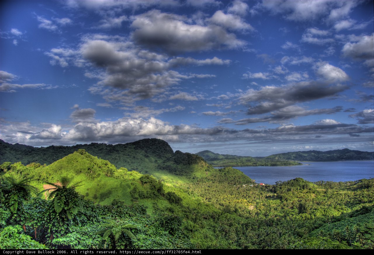 Majestic View of Mountains and Water from a Hill