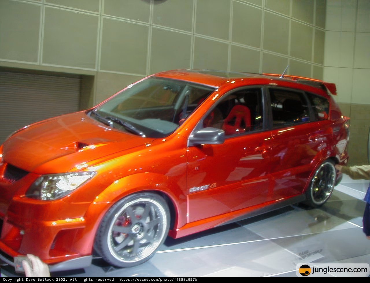 Red sports car steals the show at LA Auto Show 2002