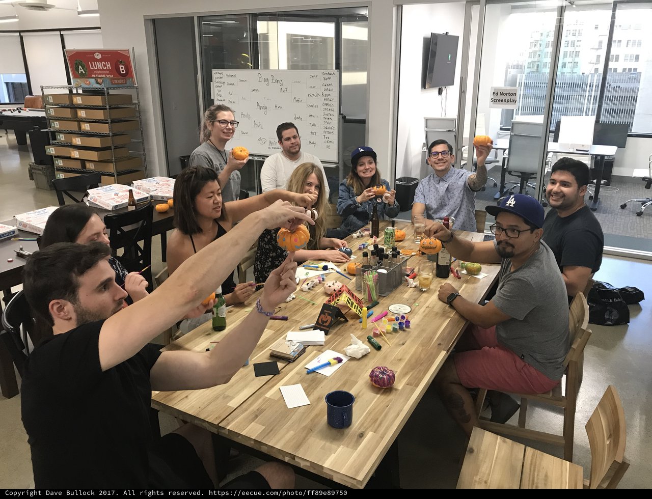 Office Team Celebrates Halloween with Pumpkin Painting
