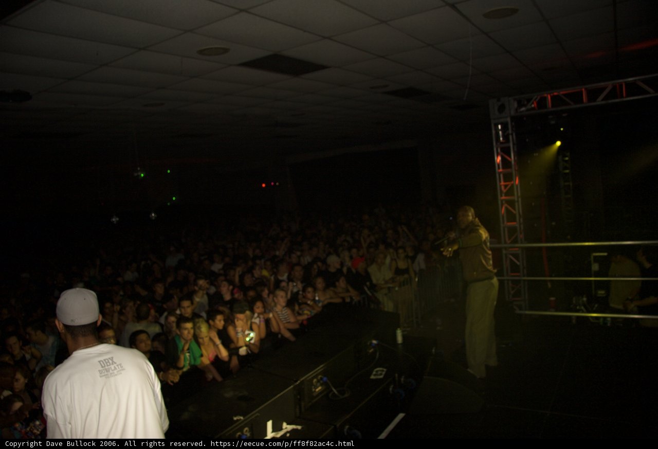 The Man on Stage: Captivating the Urban Crowd
