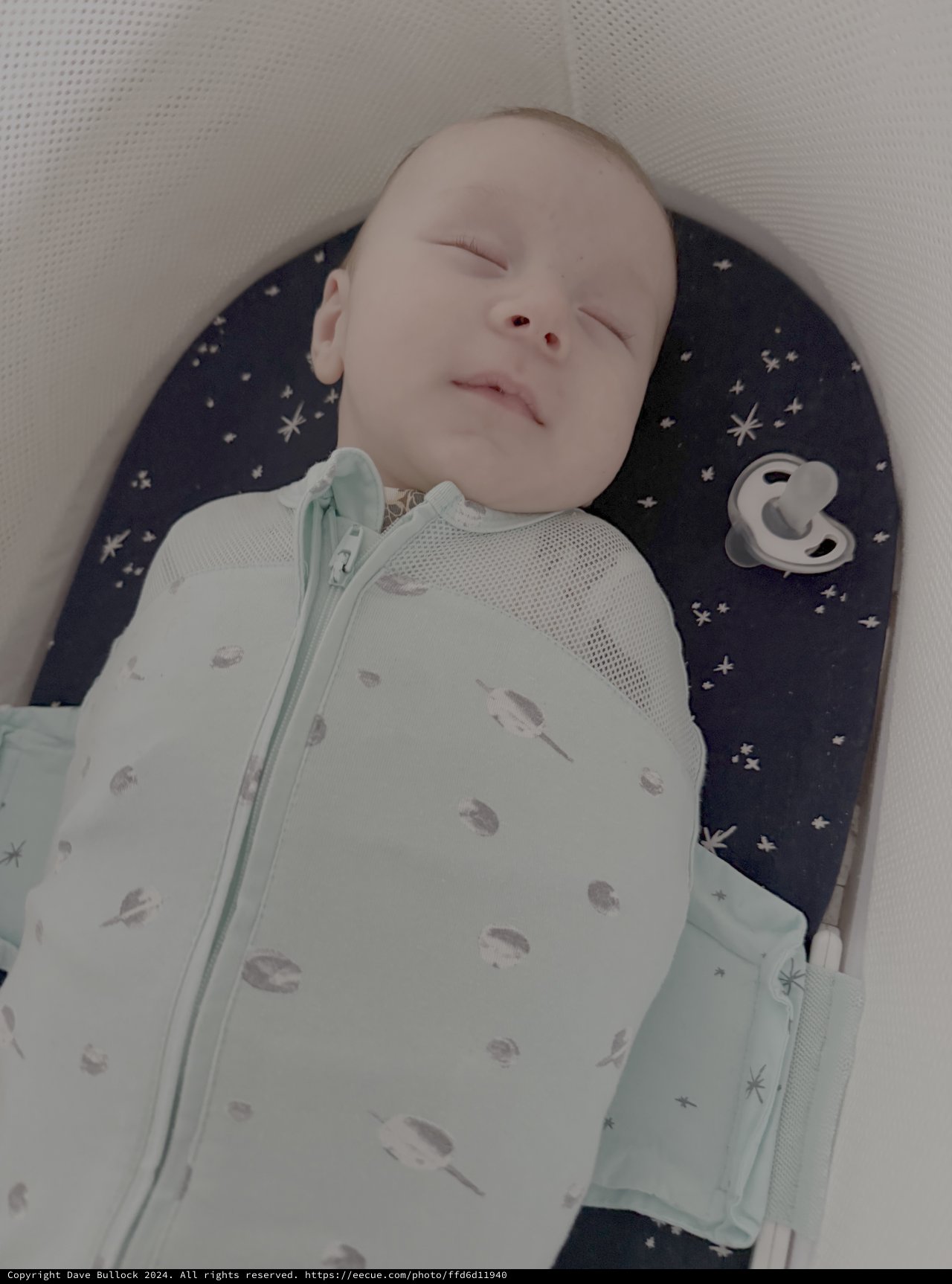 Peaceful Sleeping Newborn Baby in Crib