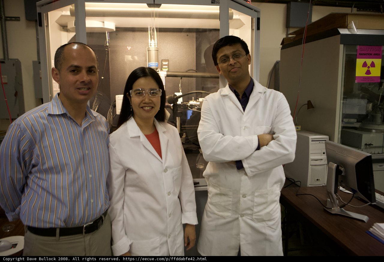 Three Scientists in Lab Coats