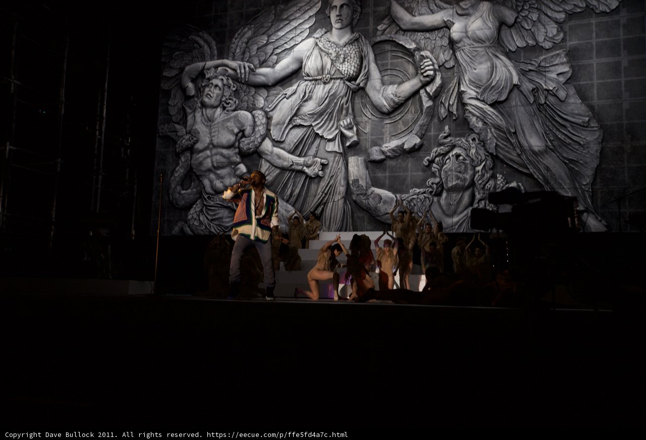 Man on Stage with Stunning Mural
