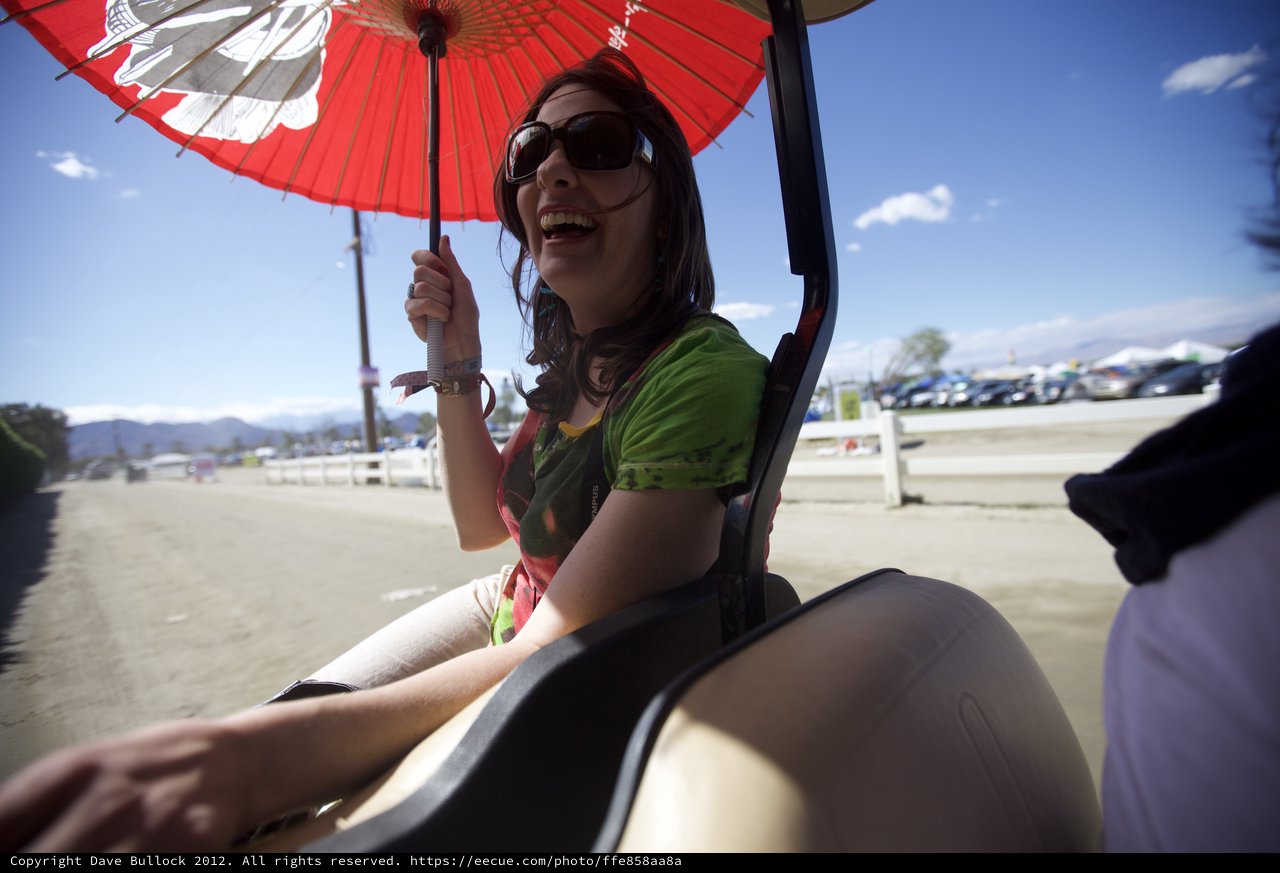 Joyful Festival Rider with Red Japanese Parasol