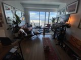 Cozy Living Room with Art and Plants
