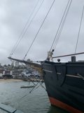 The Majestic Black Warship at the San Francisco Dock