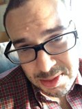 Portrait of a Happy Man with Glasses