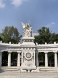 The Majestic Clock Tower and its Guardian Angel