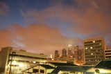 Cityscape under a Dramatic Cloudy Sky